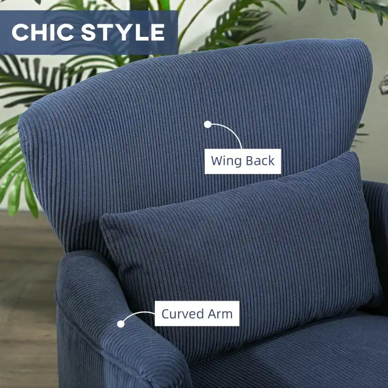 Blue corduroy accent armchair close-up showing wing back and curved arm padding