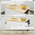 Extendable white kitchen island cart with light wood top and side rack for bottles