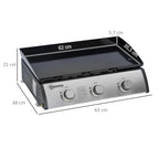 Portable tabletop gas griddle grill angled view with black cooking surface and knobs