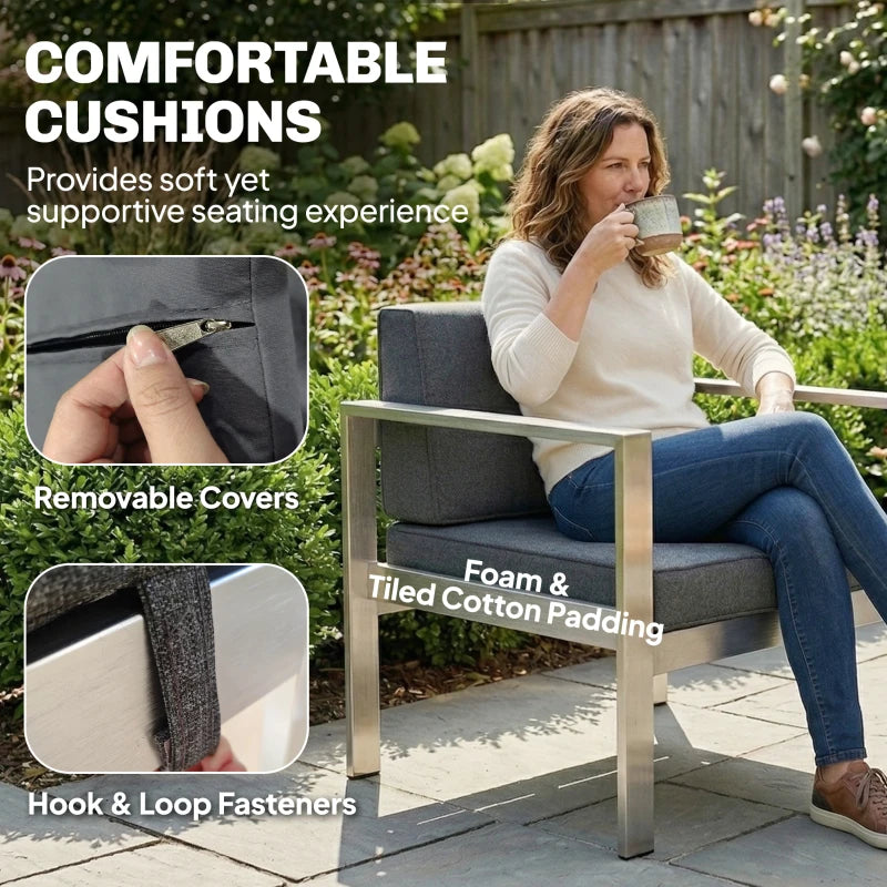 Dark grey seat and back cushions on brushed aluminium outdoor sofa set