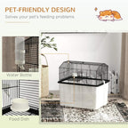 Black hamster cage with water bottle and food dish attached to the wire upper tier