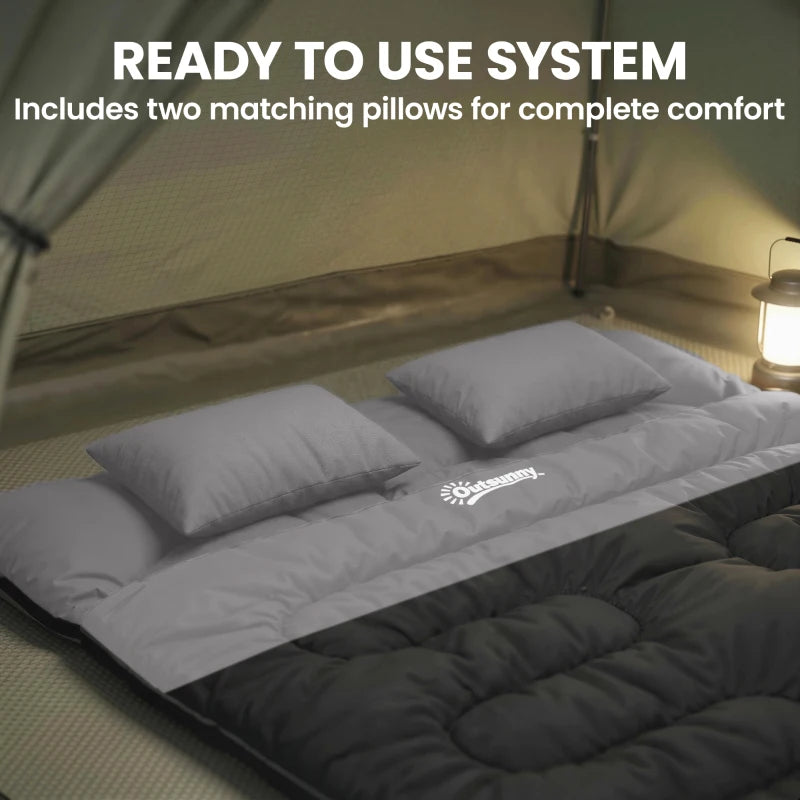 Double sleeping bag with two matching grey pillows, black and grey quilted interior.