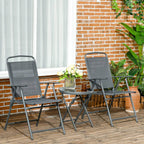 Dark grey mesh garden chairs with a round side table with glass tabletop