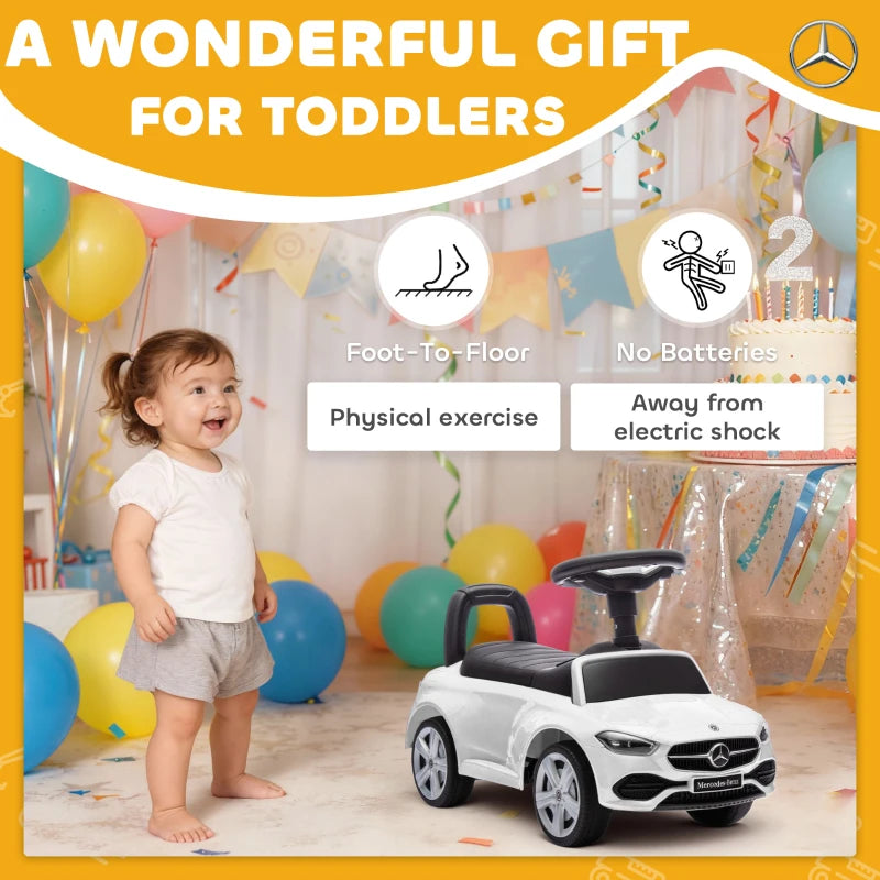 White foot-to-floor ride-on car walker with black seat, steering wheel, no battery housing