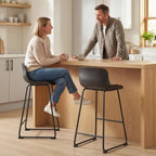 Black counter-height bar stools set of 2 with PU upholstery, rounded backrest, and footrest