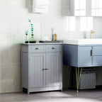 Grey bathroom storage cabinet with two drawers and double doors, freestanding unit