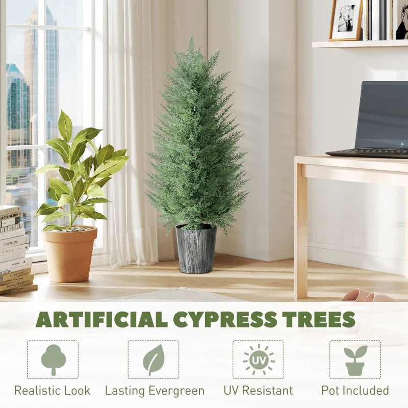 Artificial cypress tree with green foliage and gray textured pot for indoor decor