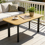 Outdoor coffee table with wood-toned slatted tabletop and dark metal legs
