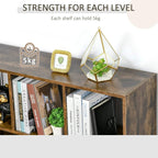 Rustic brown bookcase corner view with open shelves holding books and small decor