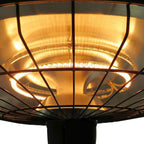 Ceiling-mounted view of black infrared patio heater with glowing inner heating grid