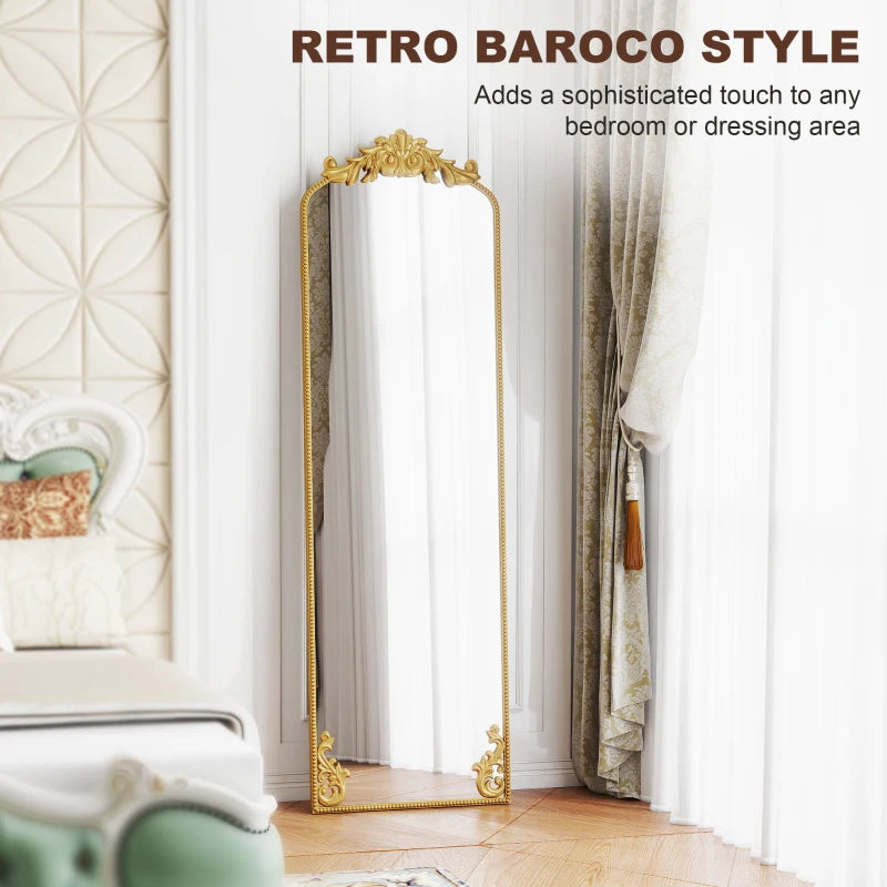 Full length mirror with decorative baroque gold frame, arched top and clear glass