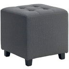 Grey upholstered square ottoman footstool with padded seat and dark legs