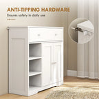 White bathroom cabinet with drawer, double doors, and visible anti-tip wall bracket