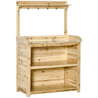 Natural wood potting bench with lower shelves and hanging hooks under the top rail.