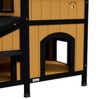 Yellow wooden cat house front with arched doorway window, black frame, and roof overhang