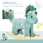 Green plush rocking dinosaur with squeezable horn for animal sounds, wooden rocker base