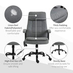 Grey linen-look office chair with thick padding and rolling base.