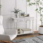 White console table with two drawers, open shelf, and carved front panel details