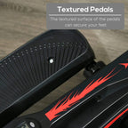 Textured black pedals with grip surface and red stripe on elliptical cross trainer