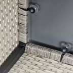 Close-up of the table's glass top supports and wicker frame