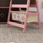 Pink easel frame with open storage baskets underneath and animal print bins